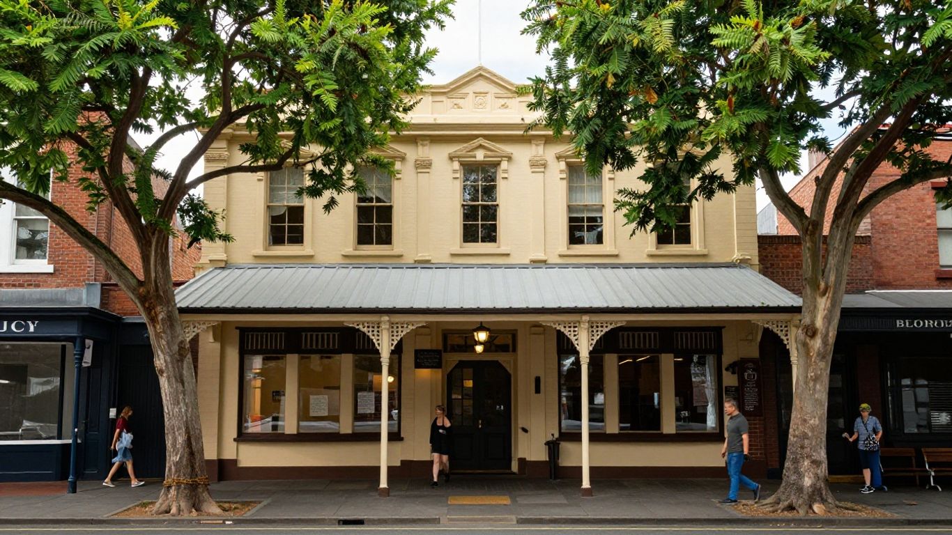 Heritage pub exterior on a leafy Fitzroy North street