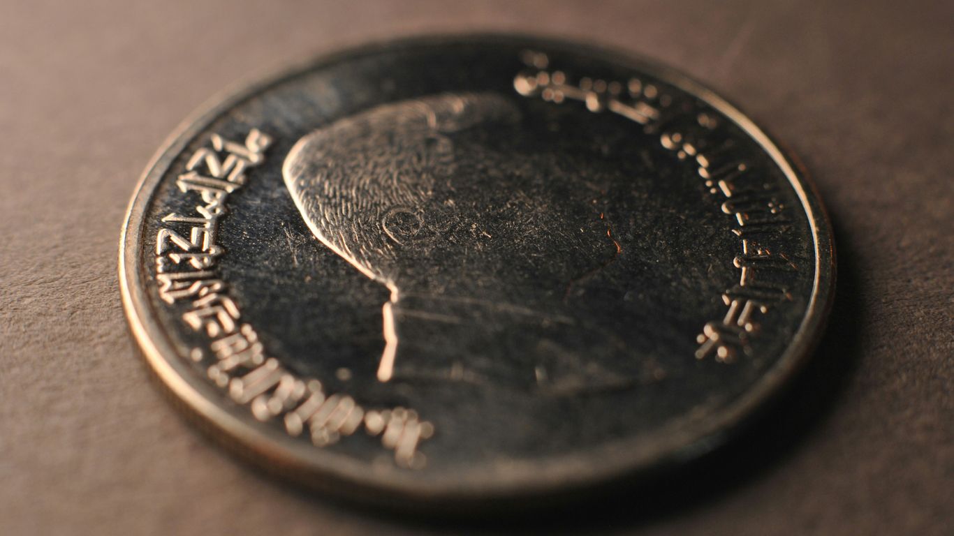 A close up of a coin on a table