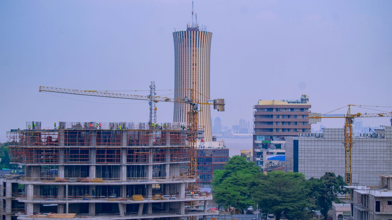 City skyline with buildings under construction.