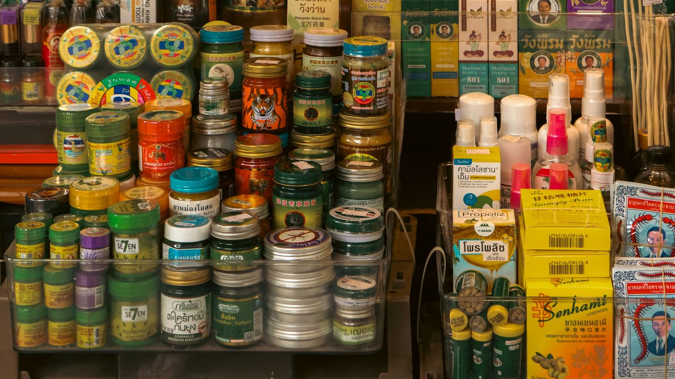 Various jars and bottles displayed on shelves