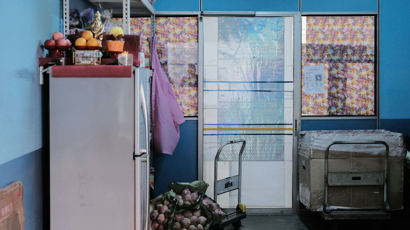 Compact Singapore flat kitchen with tiled walls