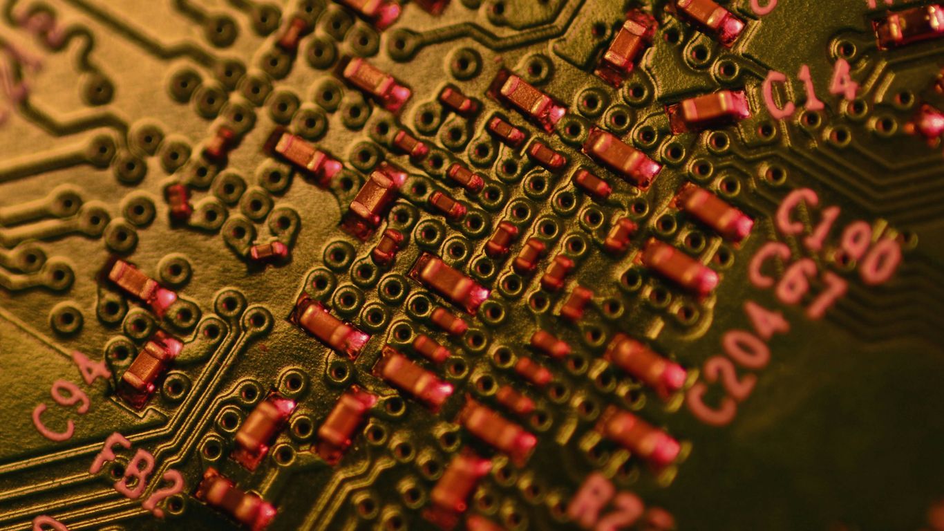 Close-up of a complex electronic circuit board with many components.