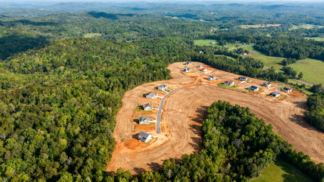 Aerial view of land clearing for agriculture and housing.