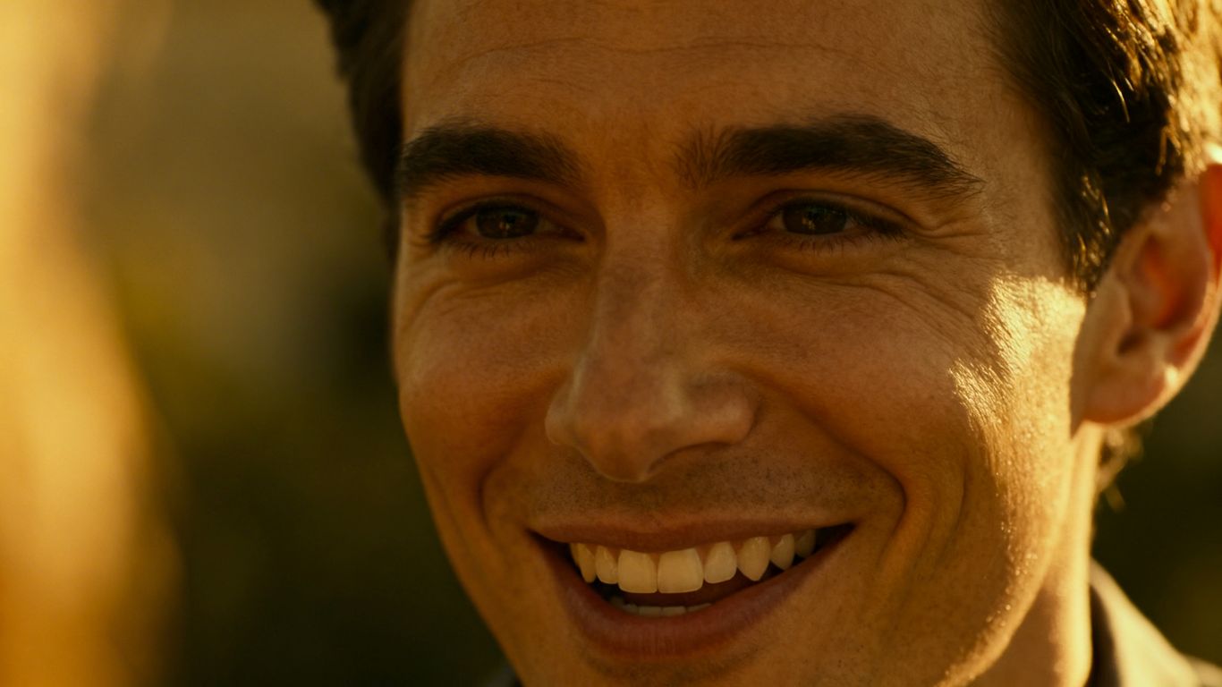 Person speaking sincerely in a video testimonial.