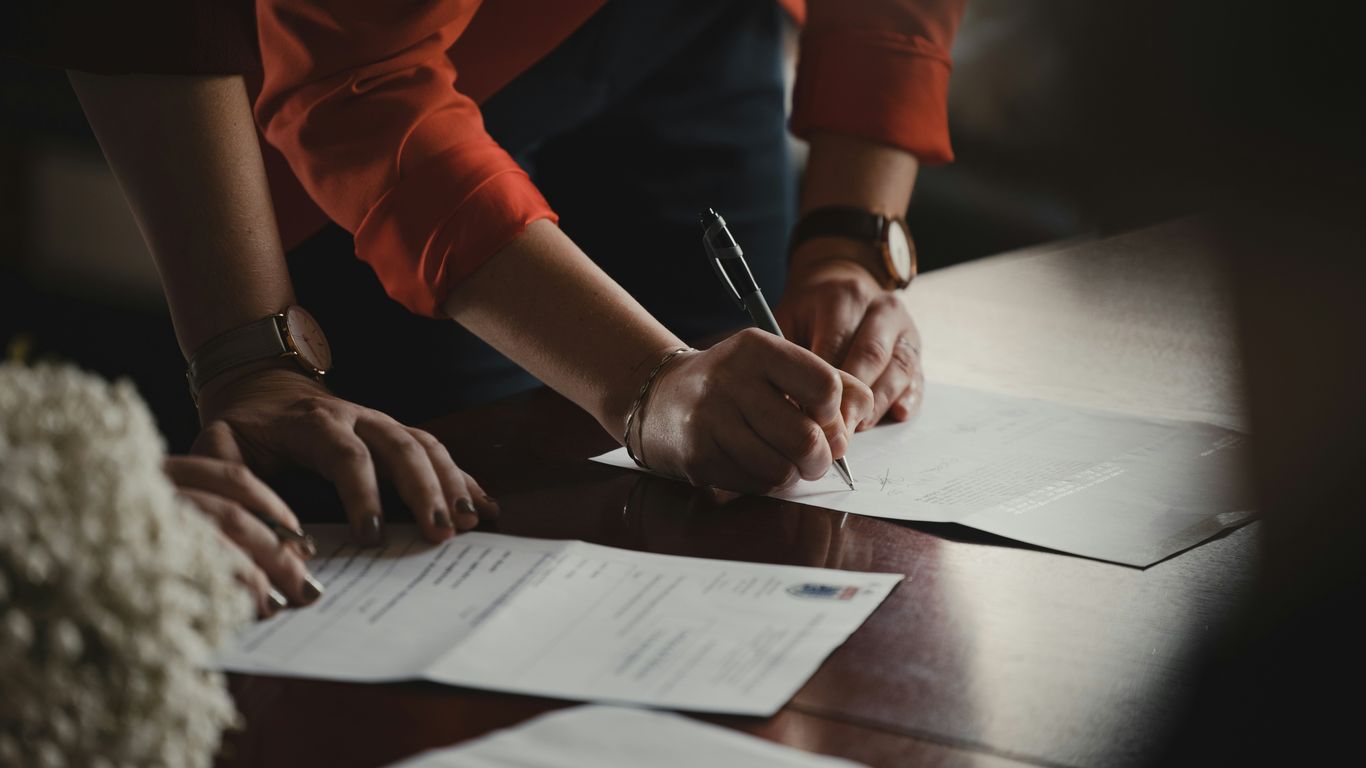 Customs broker reviewing import papers