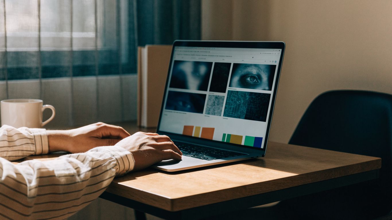 Large website images and scripts loading on a laptop