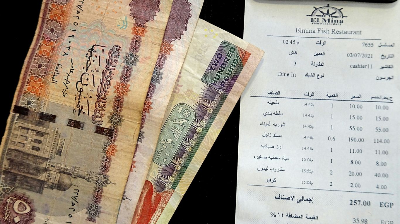 A bunch of money sitting on top of a table