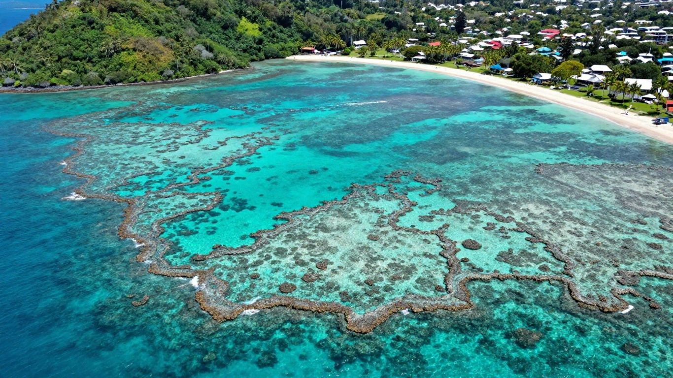 Port Douglas tropical paradise with reef and beach.