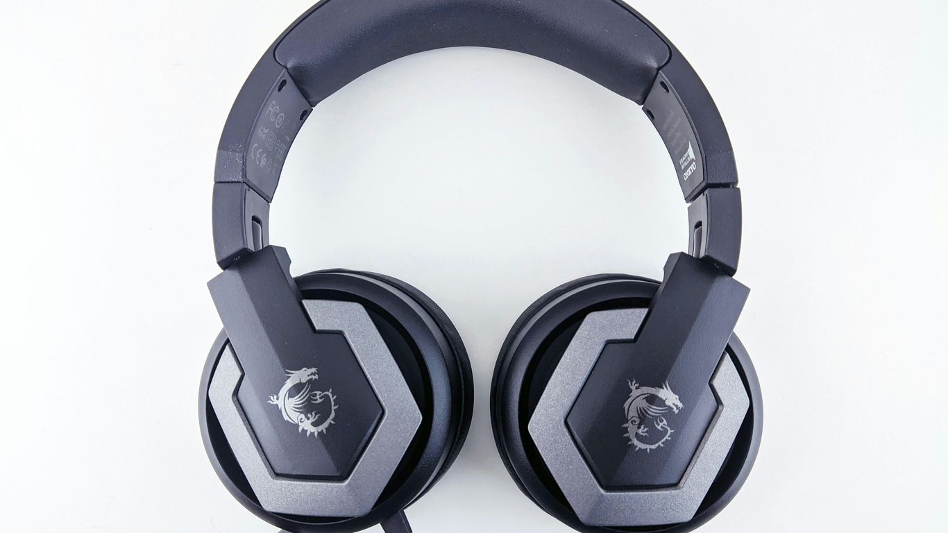 a pair of headphones sitting on top of a table