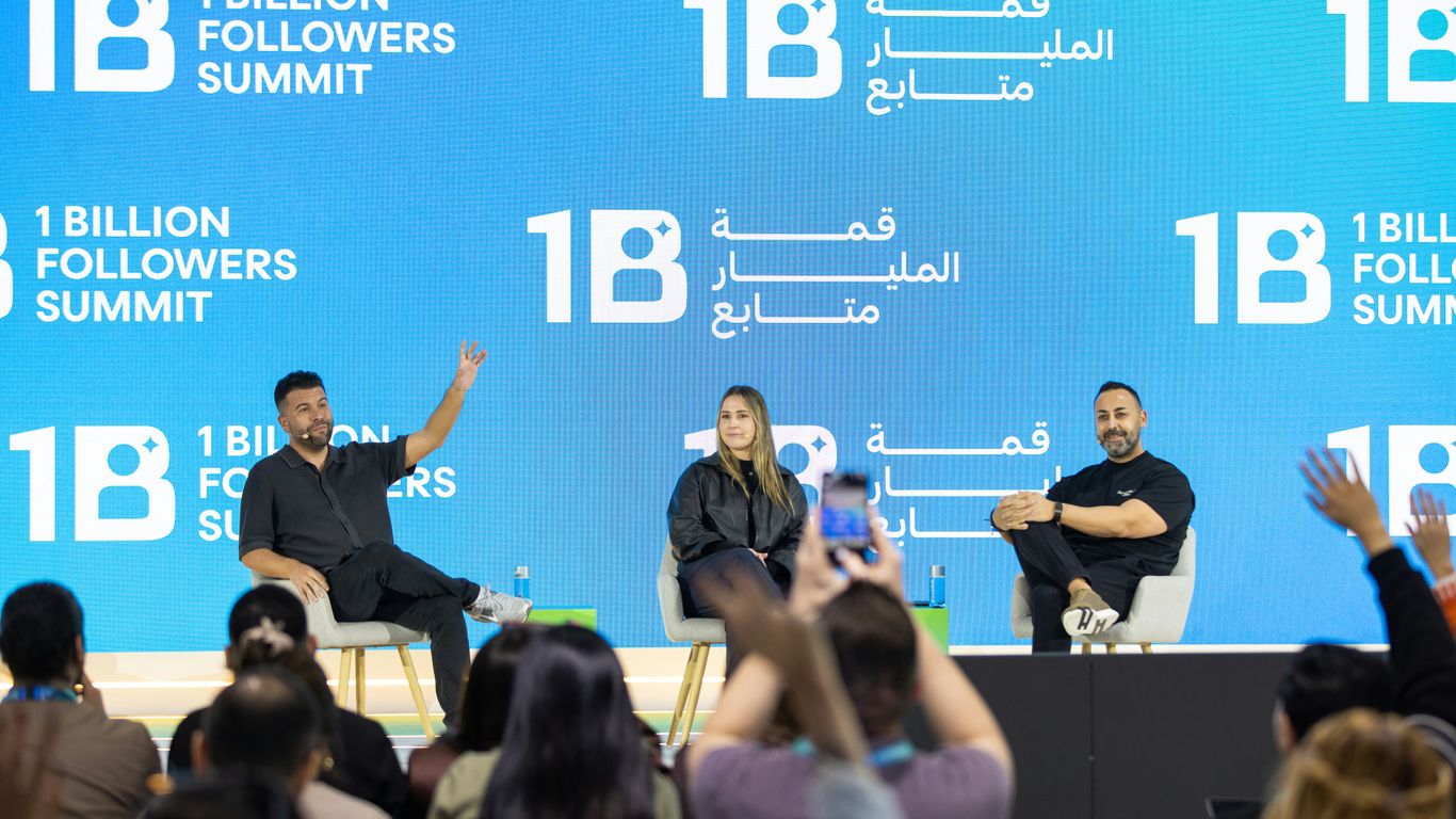Speakers on stage at 1 billion followers summit event.