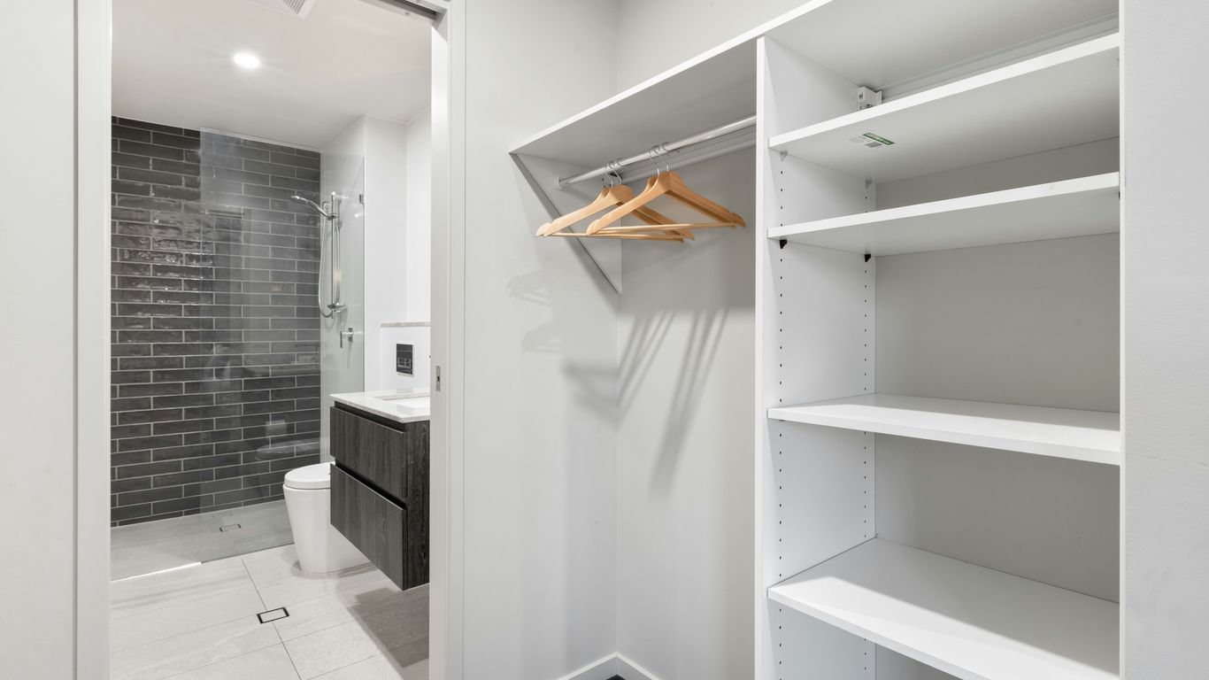 white wooden shelf with mirror