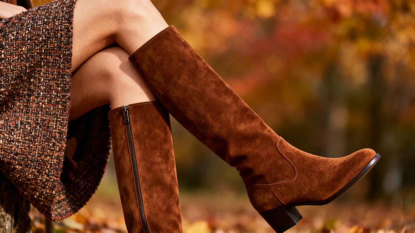 Knee-high suede boots for autumn fashion.