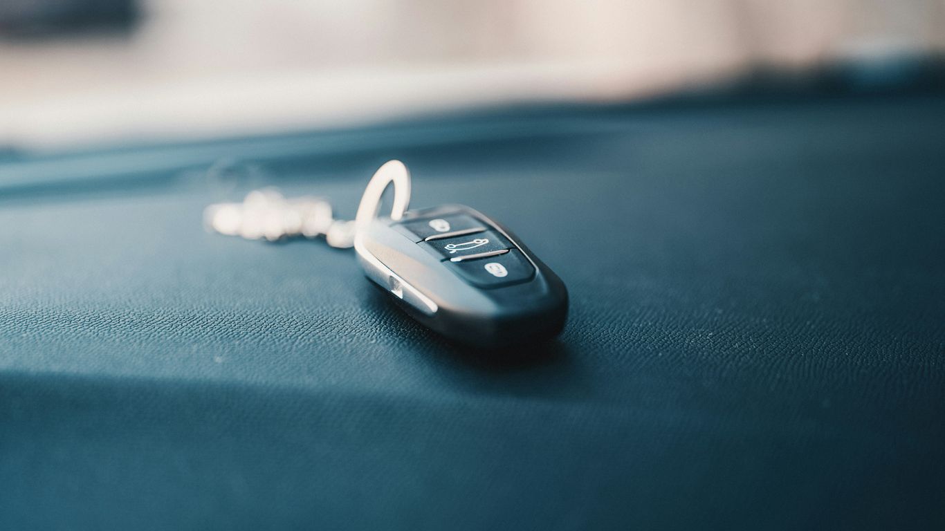 Keys beside a locked car door