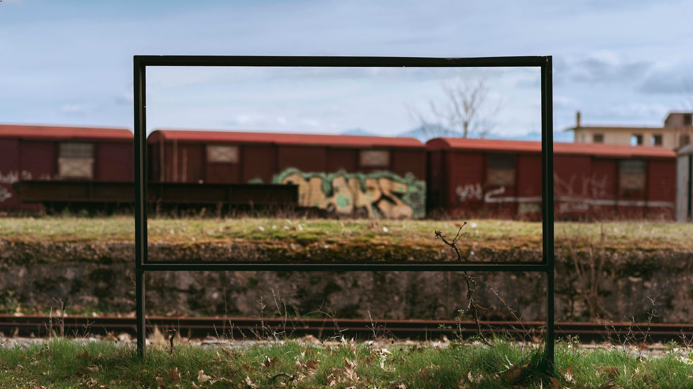 Horizontal sign holder on a wooden table