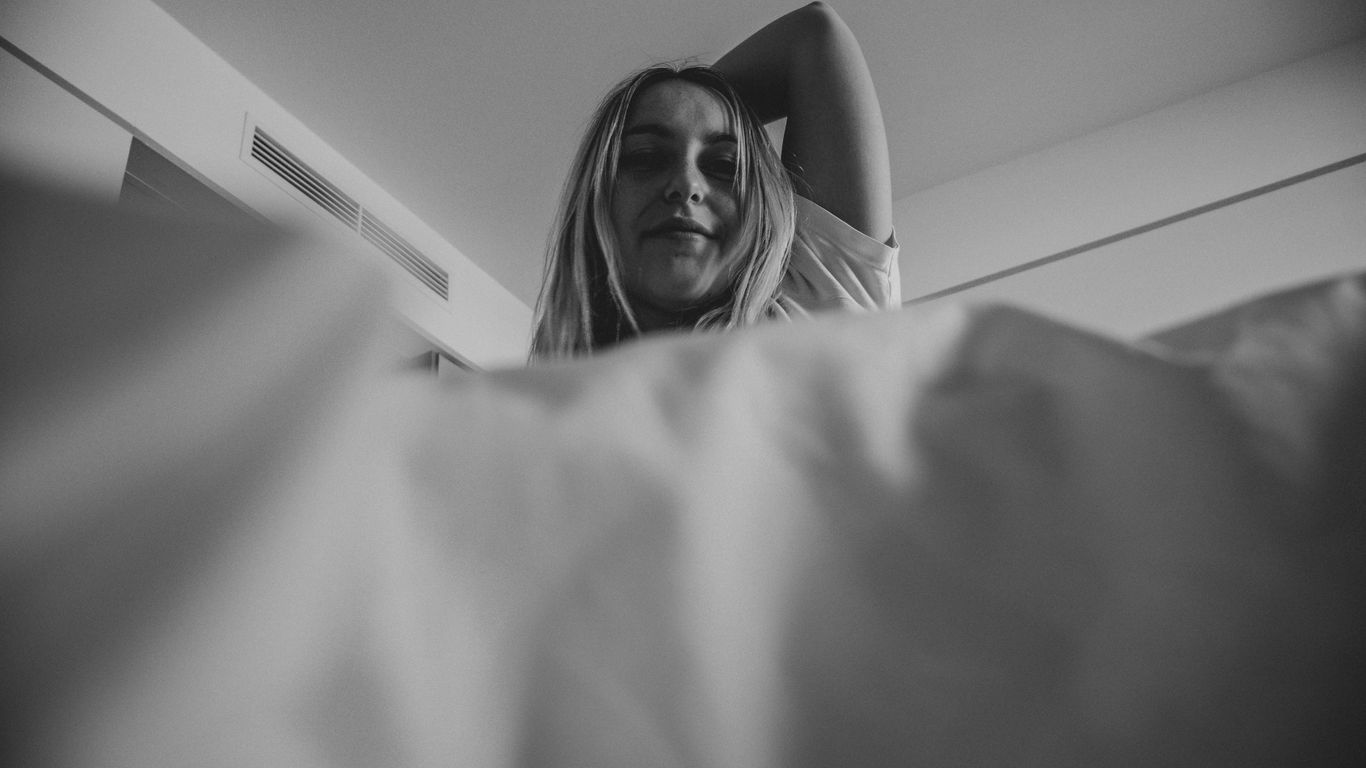 greyscale photography of woma
