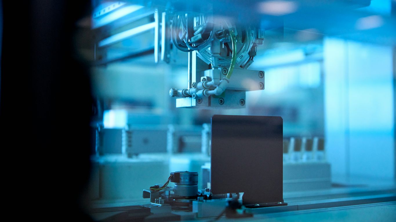 black laptop computer on table