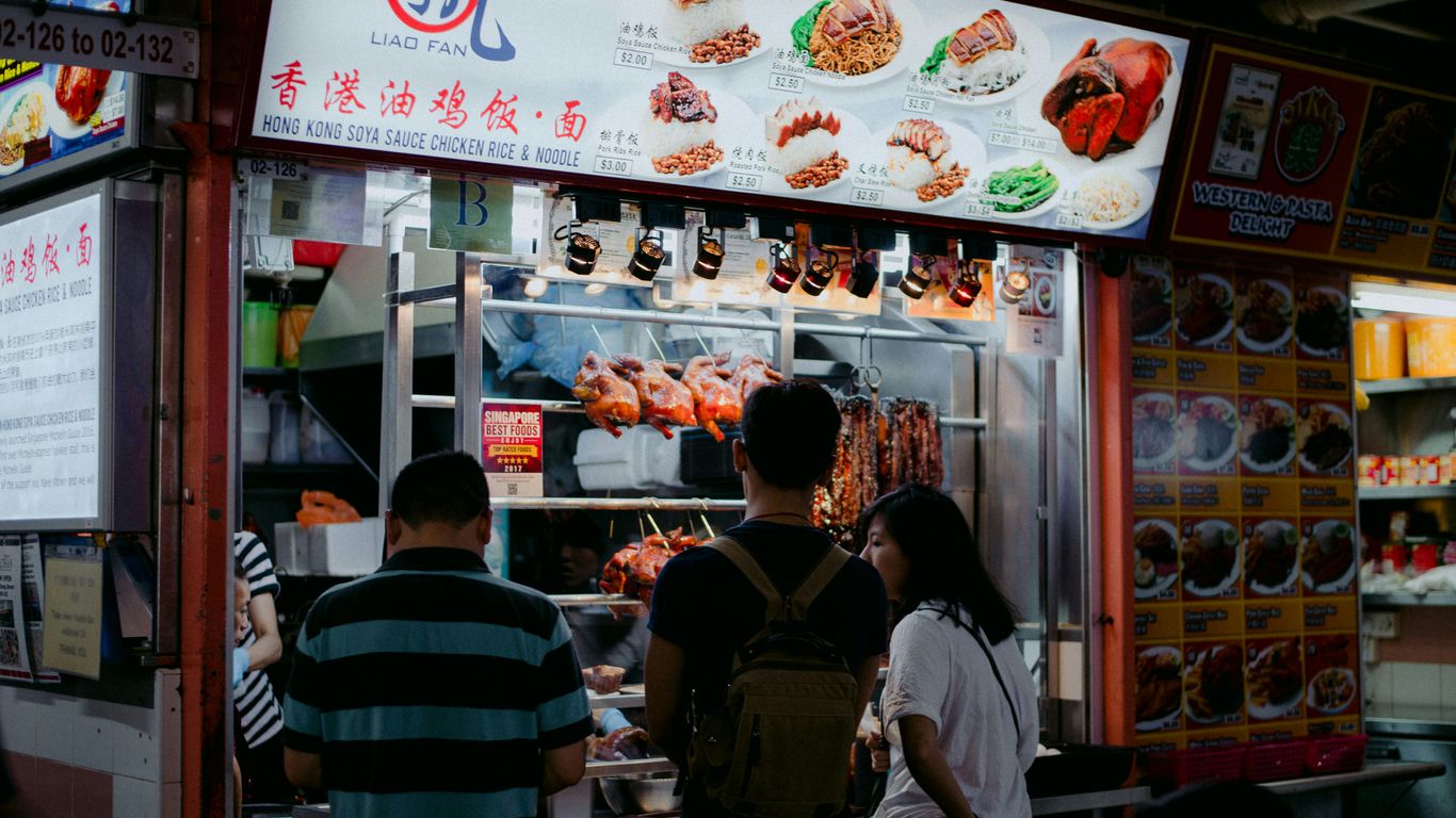 people standing in front of store