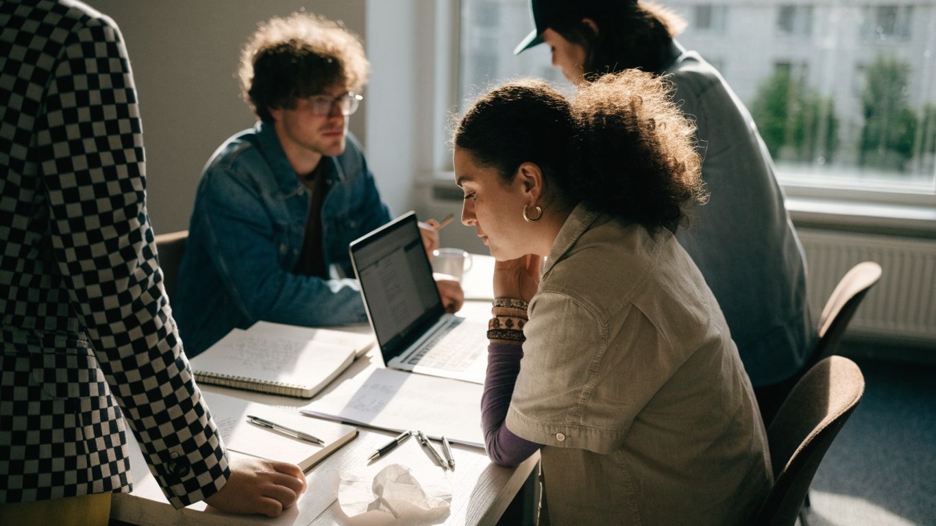 Marketing team reviewing a campaign plan together