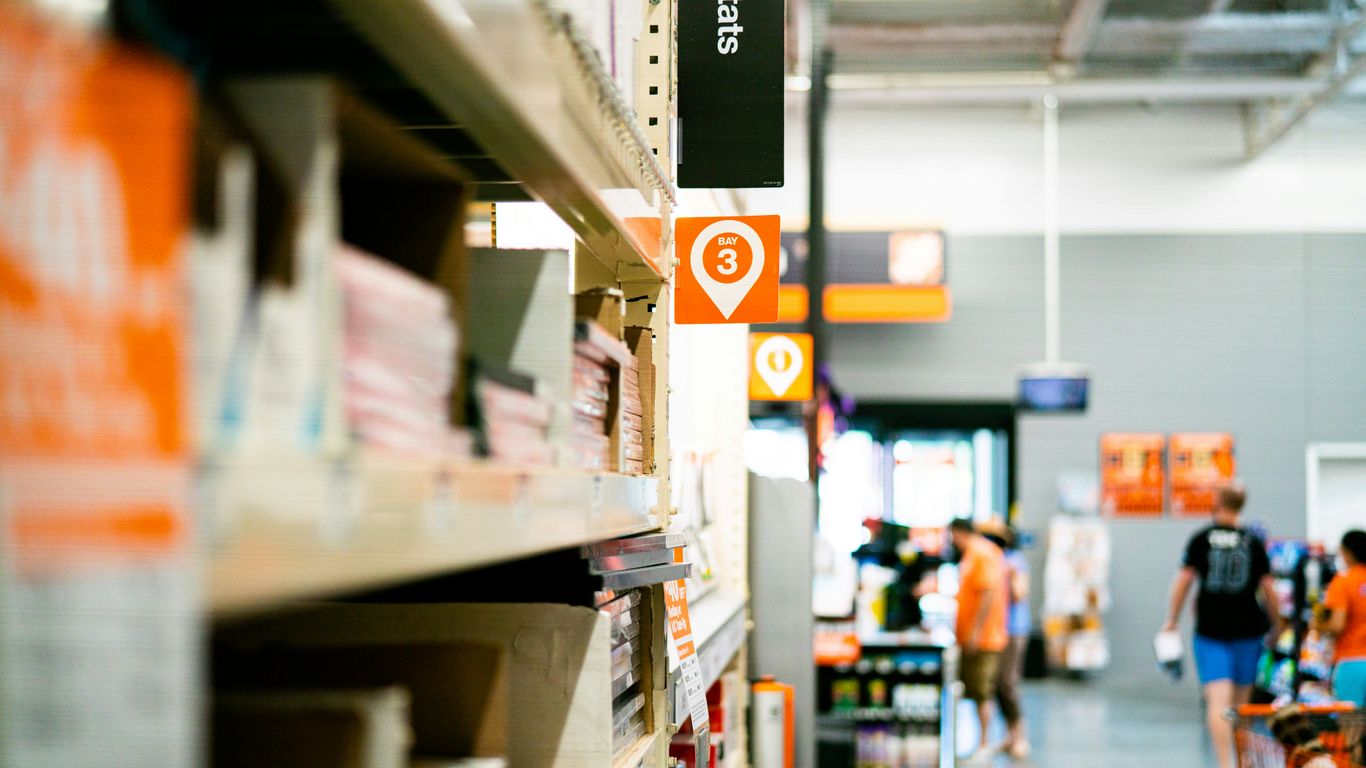 Clear signage mounted on store shelves