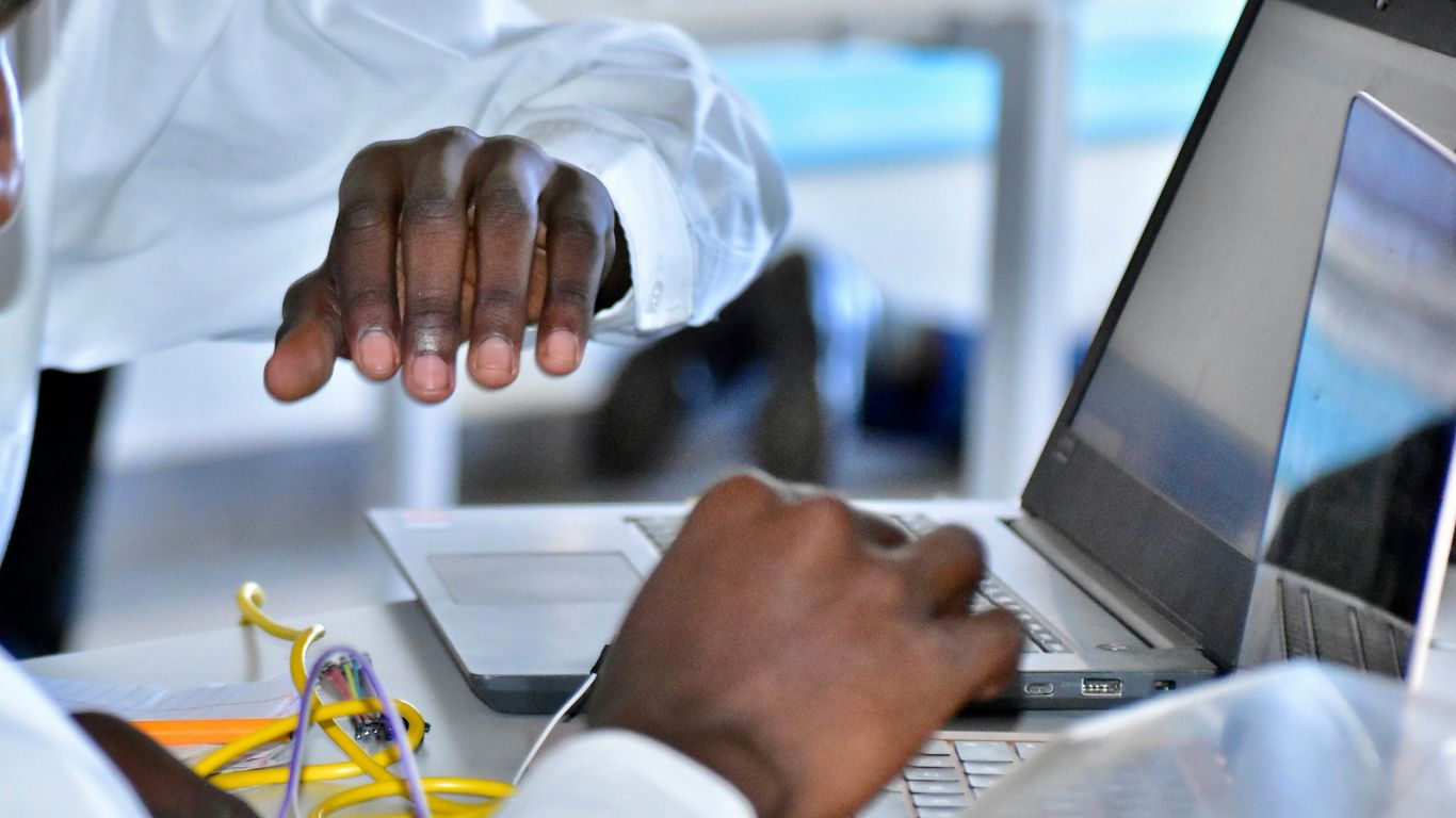 a man in a white coat