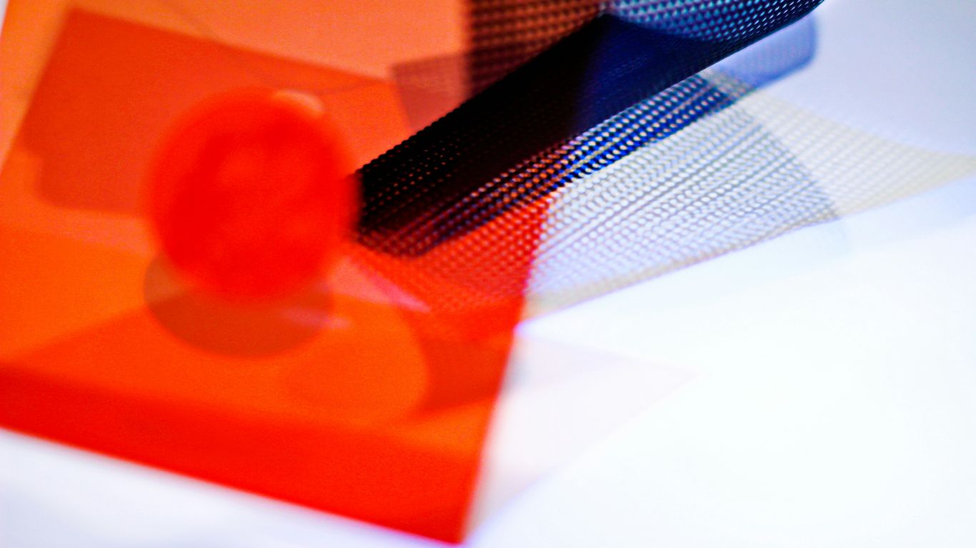 a close up of a red and blue object