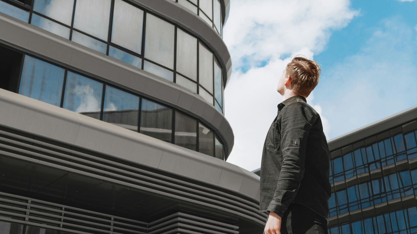a man standing outside a building