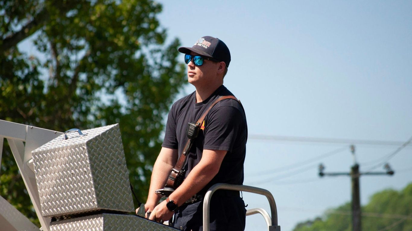 Tree service owner reviewing advertising data