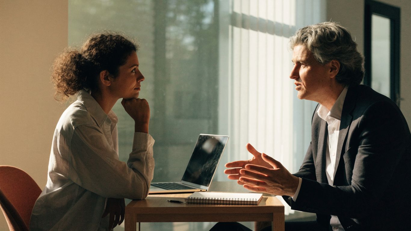 Executive and founder discussing engagement scope
