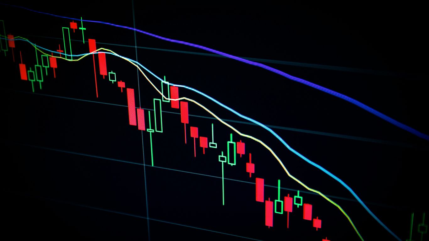 Investor reviewing quantum technology charts