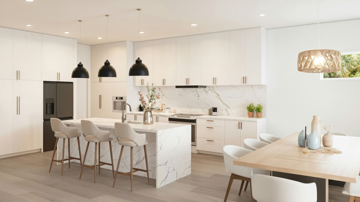 Waterfall edge marble table in modern dining room
