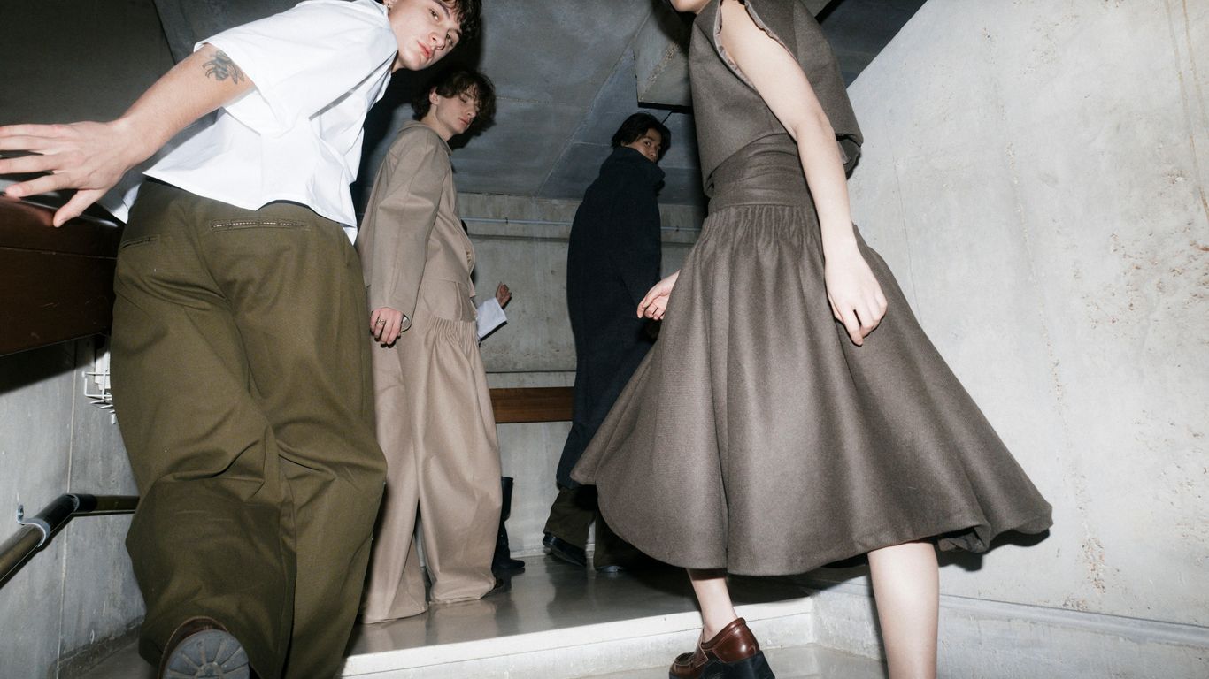 People are descending a staircase together.