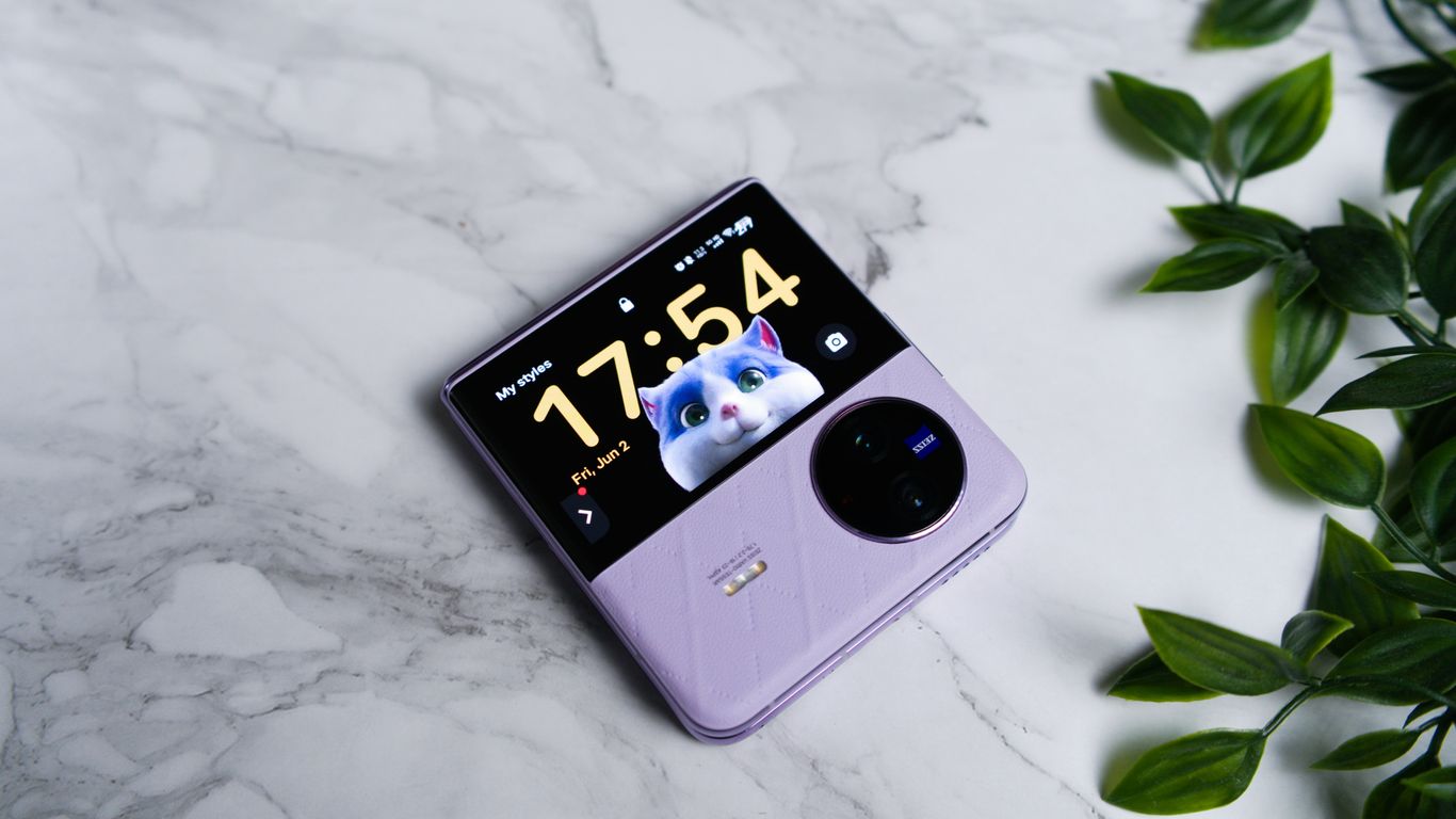 a cell phone sitting on top of a marble counter