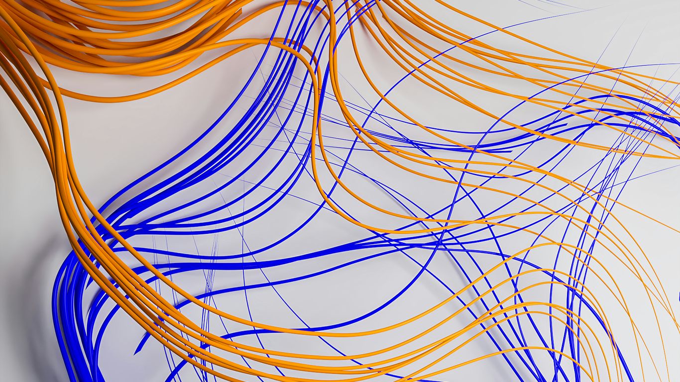 a bunch of orange and blue wires on a white surface