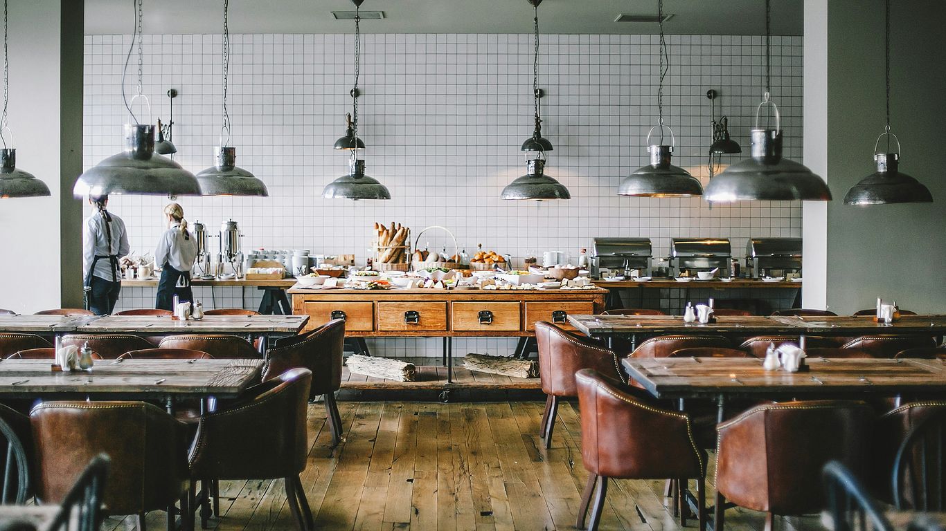Shoppers browse a modern food hall design