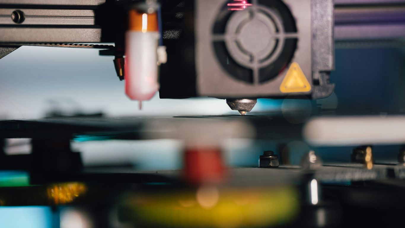 a close up of a machine that is making something