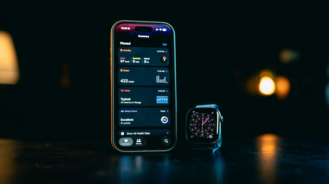 Smartphone and smartwatch displaying apps on-screen data