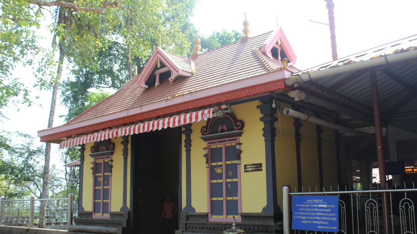 Visitors entering temple gates