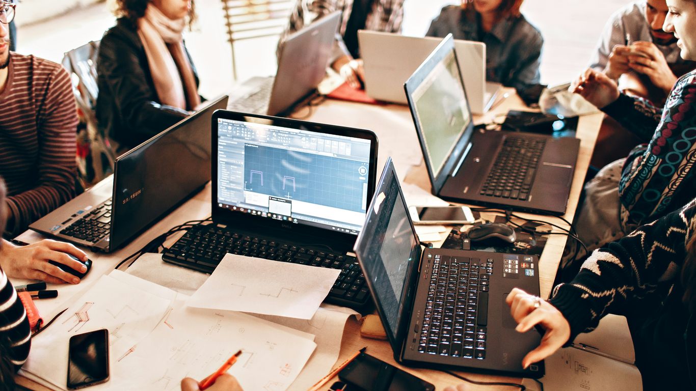 person using black laptop computer