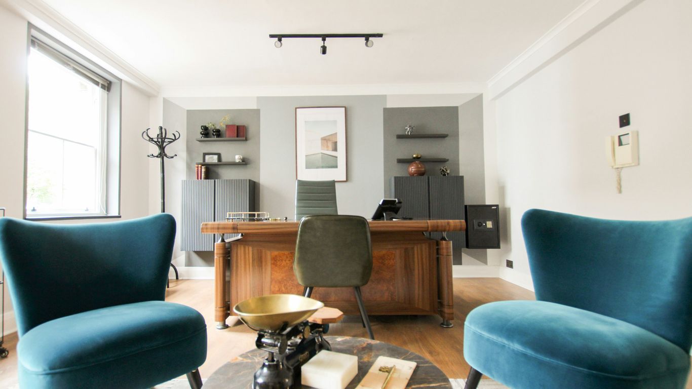 A clean, modern home office featuring new flooring
