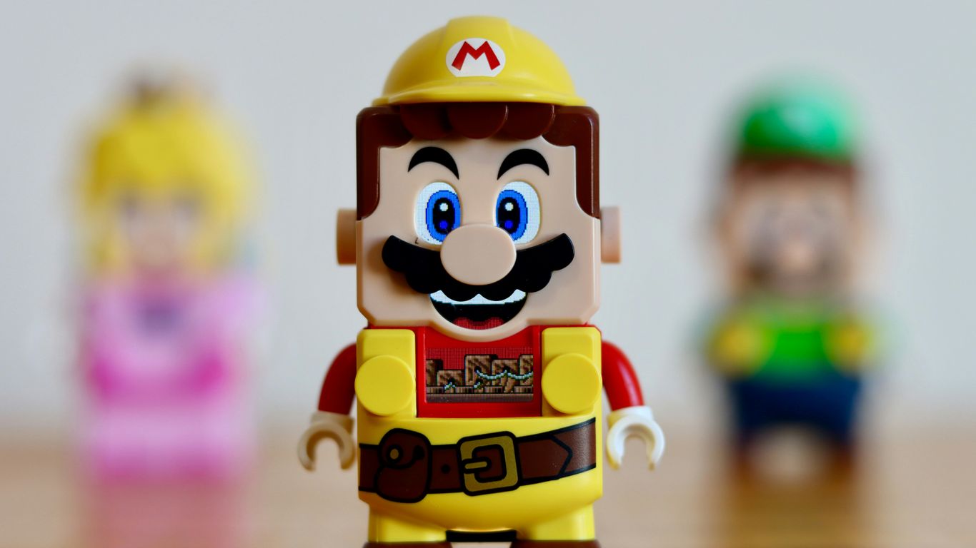 a close up of a toy figure on a table