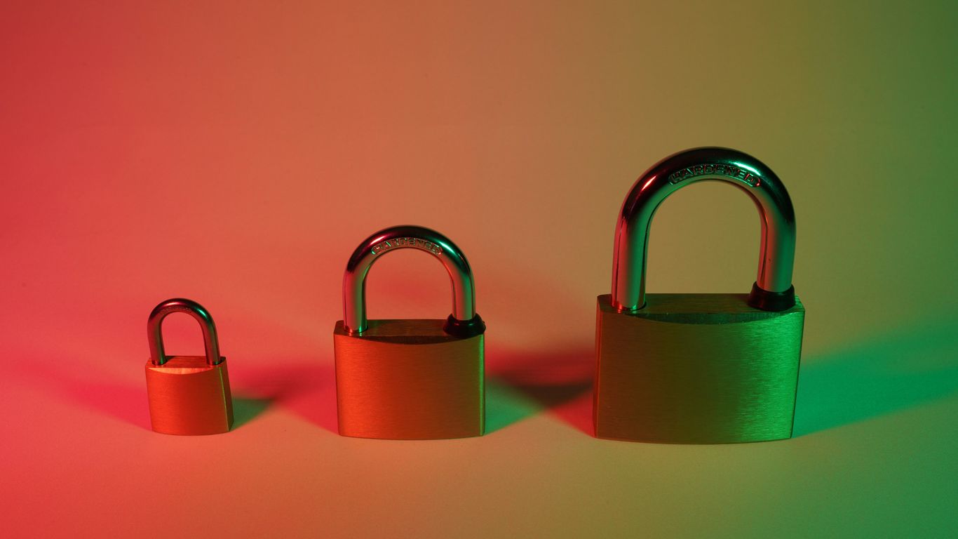 two pink padlock on pink surface