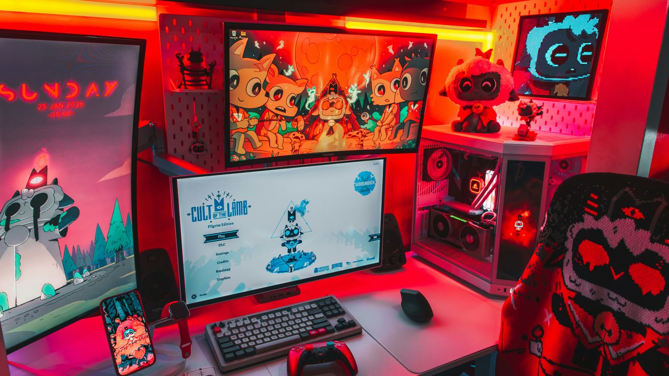 Gamer's setup with multiple monitors and rgb lighting