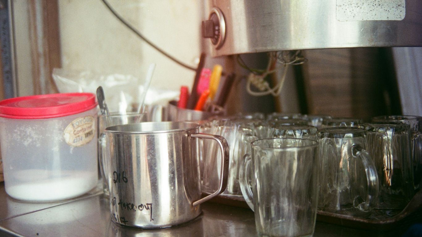 a bunch of cups that are sitting on a counter