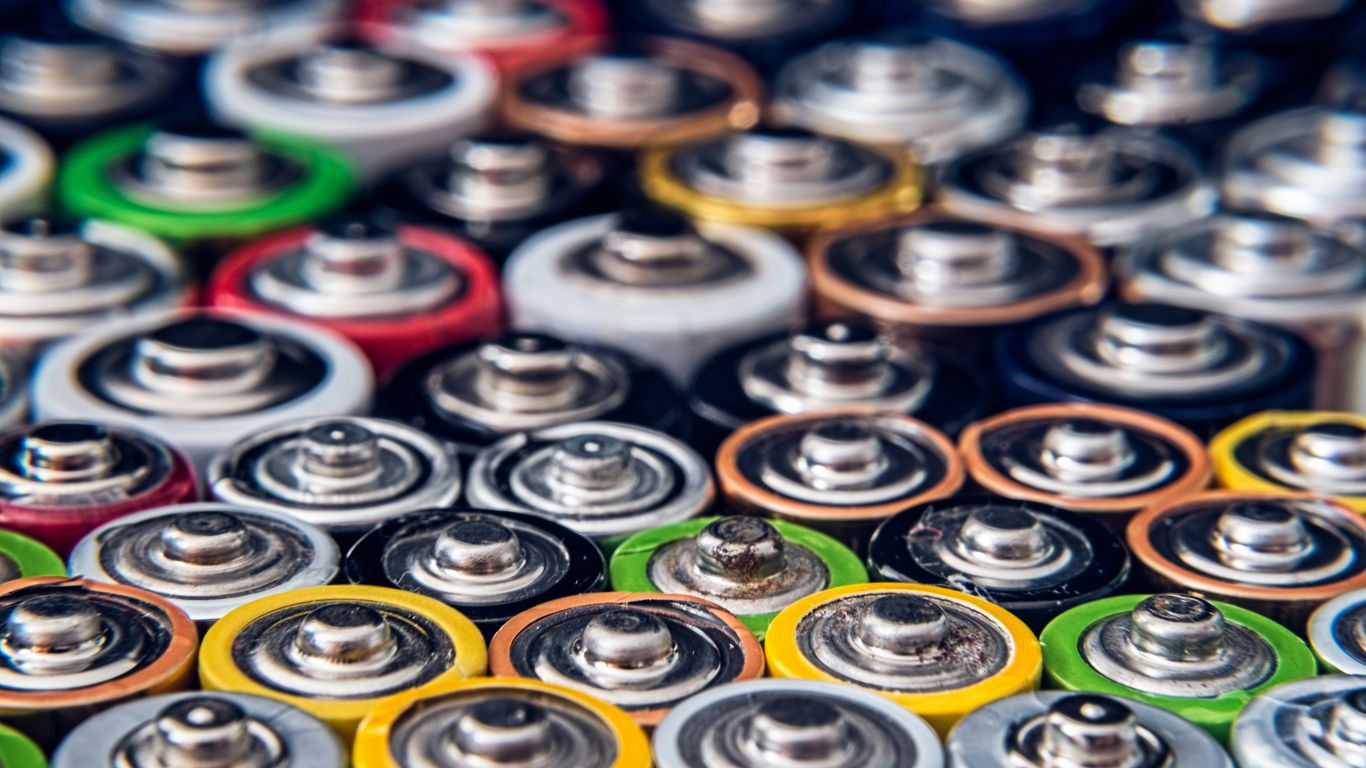 Battery test documents beside vape packaging