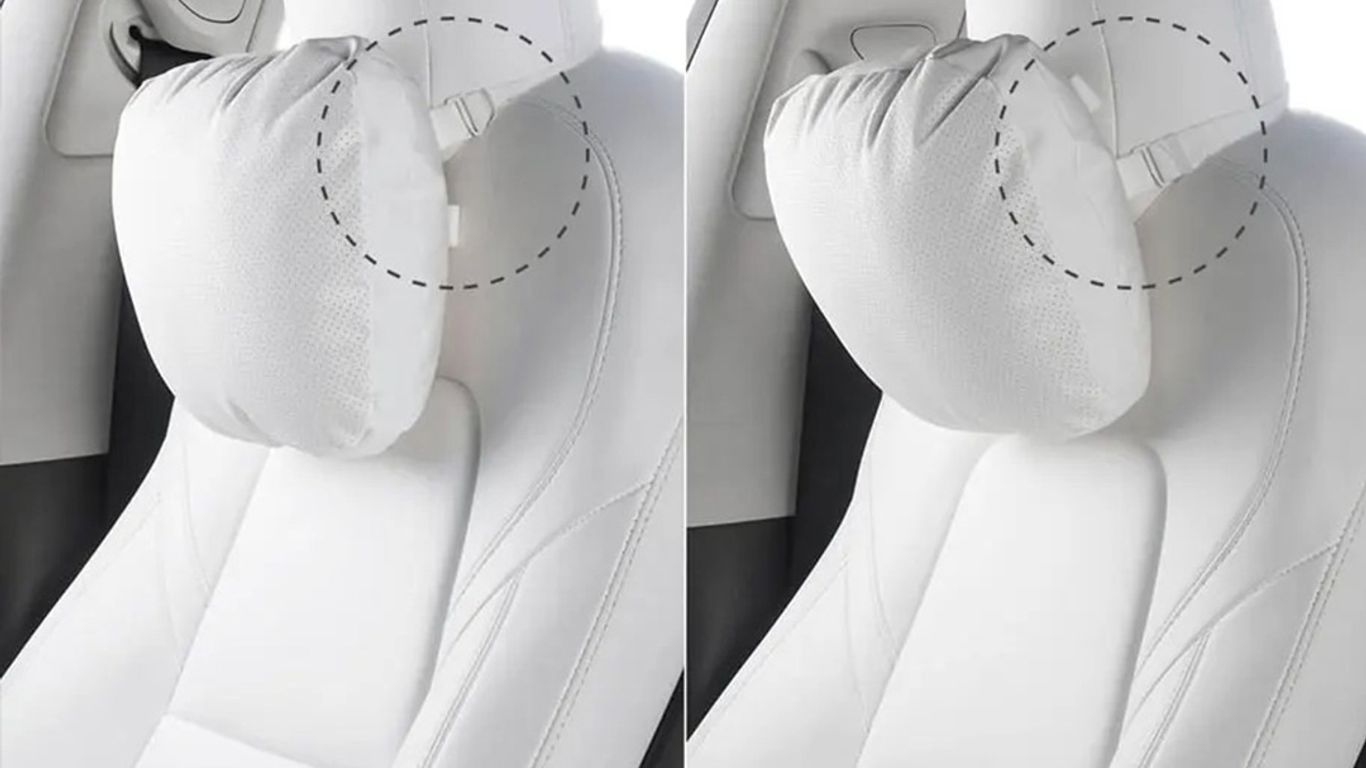 Image shows two headrest neck pillows for car seats.