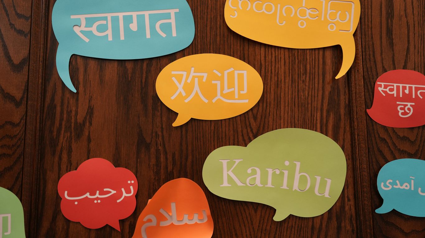 A group of colorful speech bubbles on a wooden wall
