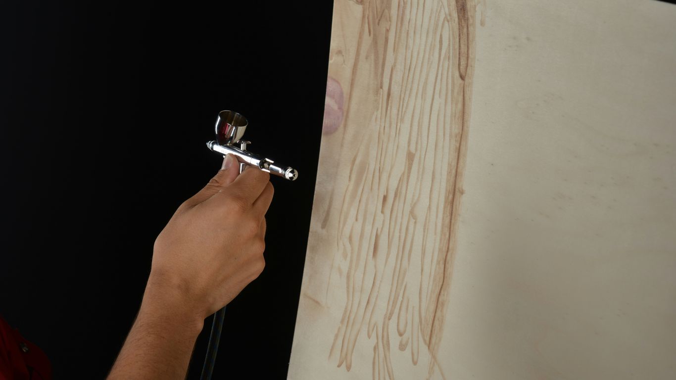 person holding silver steel door lever