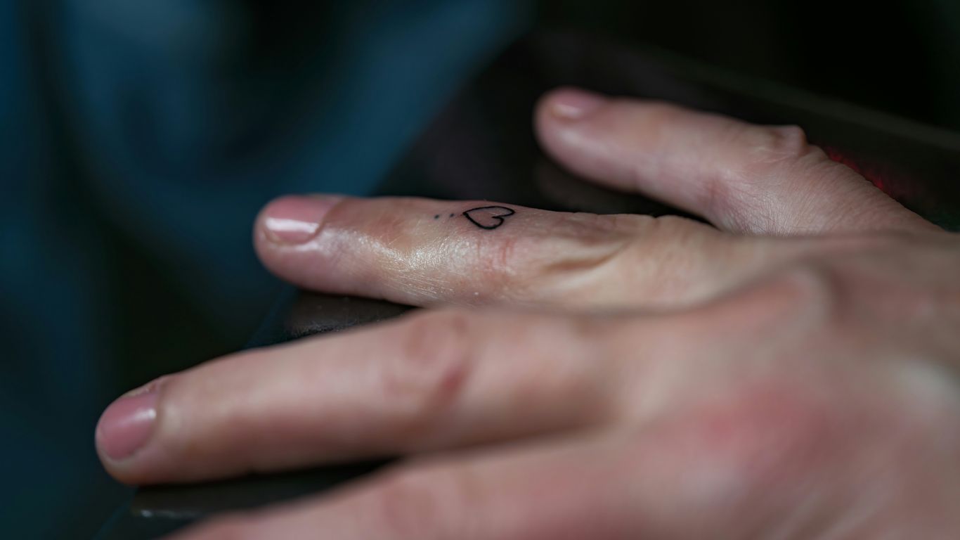 A close up of a person holding a cell phone