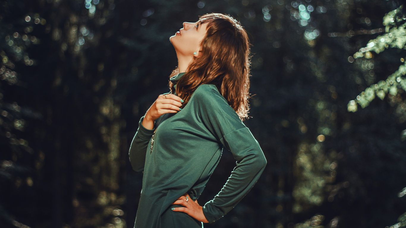selective focus photo of woman looking up