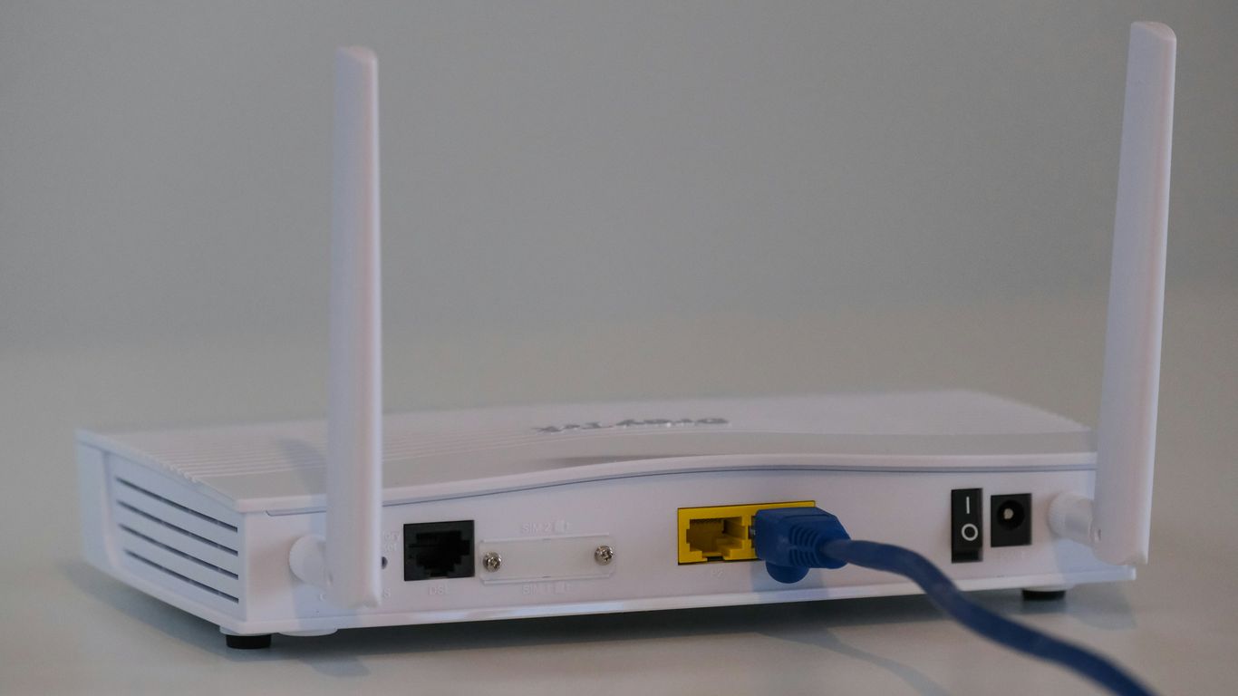white router on white table